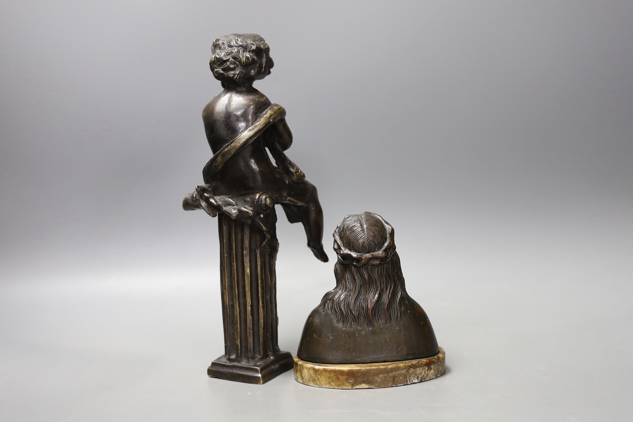 A bronze putto on column and a spelter bust of Christ - tallest 26cm